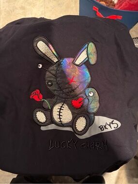 Lucky Charm Black Crewneck Sweater with Iridescent Bunny Patch